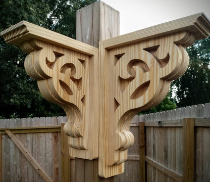 Two wood corbels outdoors